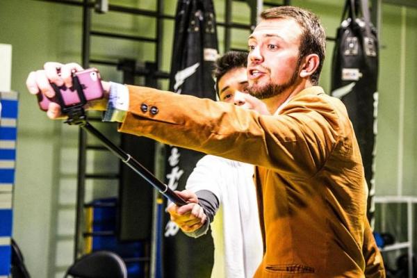 Moscow-martial-arts-school-teaching-self-defense-with-selfie-sticks - MyMMANews Students at the M-PROFI combat sports center in Moscow learn to incorporate selfie sticks into self defense techniques. Photo courtesy of M-PROFI