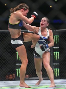 MMA: UFC Fight Night-Eye vs Tate - MyMMANews Jul 25, 2015; Chicago, IL, USA; Jessica Eye (blue gloves) fights against Miesha Tate (red gloves) during UFC Fight Night at United Center. Mandatory Credit: Dennis Wierzbicki-USA TODAY Sports