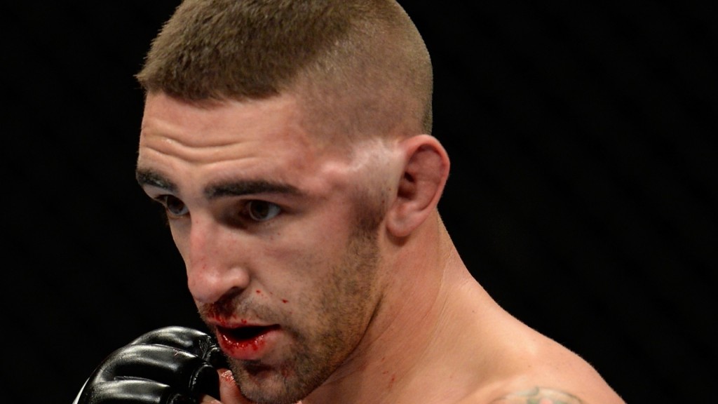 joe-proctor-venceu-justin-salas-mesmo-com-esse-enorme-hematoma-na-parte-esquerda-da-cabeca-1405592930781_1920x1080 - MyMMANews The side of Joe Proctor's head grew in size during a fight with Justin Salas.