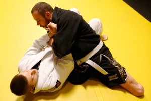 Joey Bozik practices with Justin Oberle during a Brazilian jiu-jitsu training session.