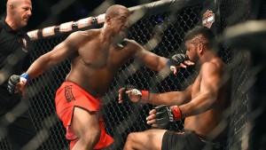 LAS VEGAS, NV - JULY 06: (L-R) Eddie Gordon punches Dhiego Lima in their middleweight fight during the Ultimate Fighter Finale inside the Mandalay Bay Events Center on July 6, 2014 in Las Vegas, Nevada. (Photo by Jeff Bottari/Zuffa LLC/Zuffa LLC via Getty Images)