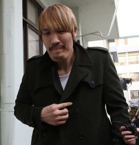 PHOTO NEWS) — Choi Hong-man, a South Korean mixed martial arts fighter, leaves a courthouse in Seoul on Jan. 14, 2016, after his sentencing on fraud charges. The 35-year-old, who towers at 2.18 meters (7′ 2″) in height, was sentenced to one year in jail on a two-year suspension. He is accused of not paying back HK0,000 he borrowed from an acquaintance in December 2013, reportedly to buy a pair of watches for himself and his girlfriend.