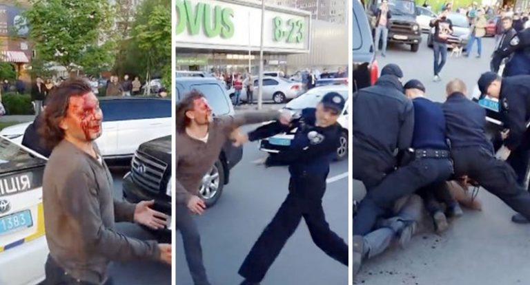 Former Olympic wrestler Vyacheslav Oliynyk fights off seven police officers. Photo courtesy of craziestsportsfights.com